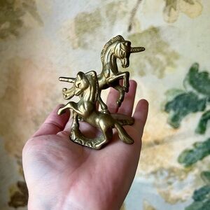 Two Brass Unicorns